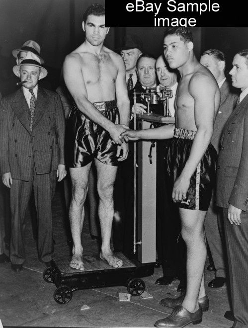 Description 1936 TITLE Louis, Schmeling weigh in for battle. Max 