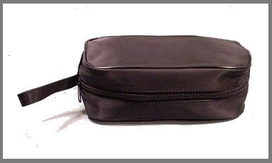 BLACK   Travel bag or shaving kit or makeup kit.  