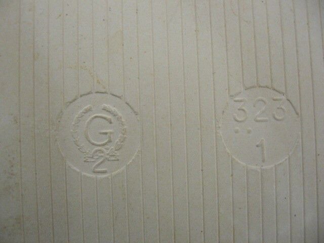  have for sale a pair of 4 x 4 ceramic tile made in Germany. The tile 