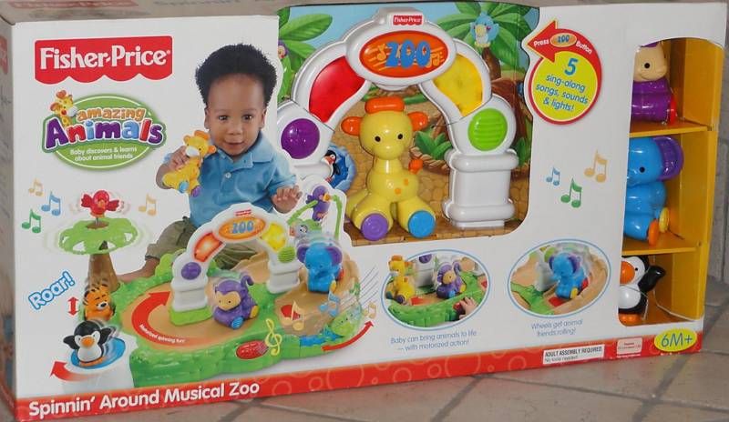 FISHER PRICE AMAZING ANIMALS SPINNIN AROUND MUSICAL ZOO  